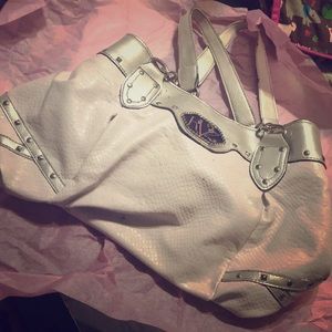 Women’s white,silver, and black KVZ purse